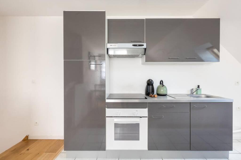 Grand Confort, Appartement Osny Esterno foto