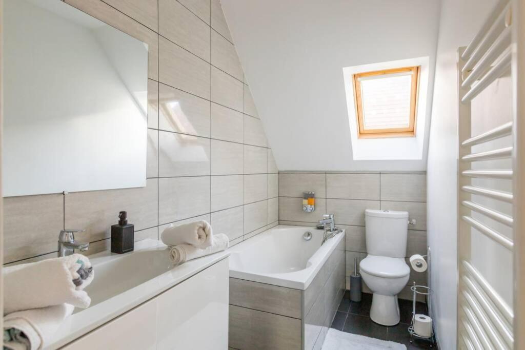 Grand Confort, Appartement Osny Esterno foto