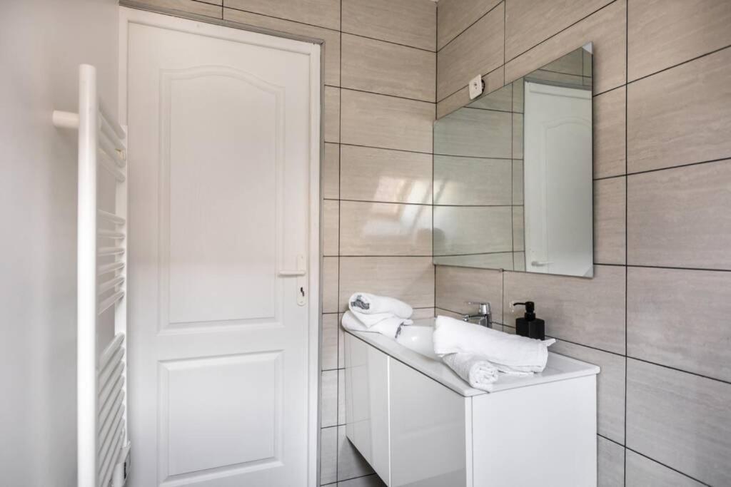 Grand Confort, Appartement Osny Esterno foto