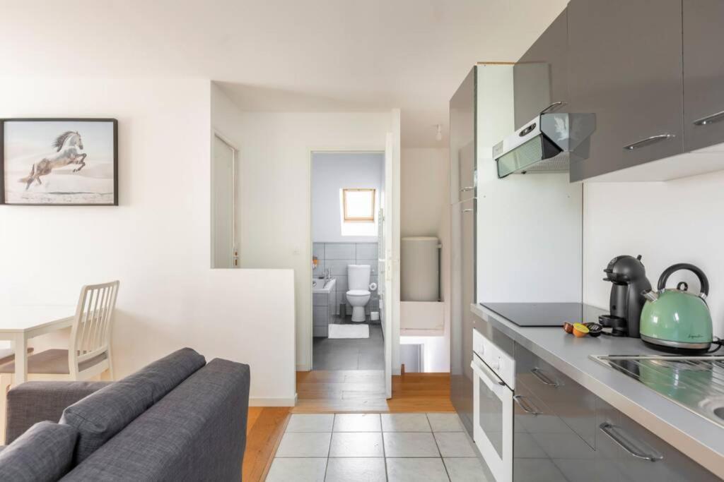 Grand Confort, Appartement Osny Esterno foto